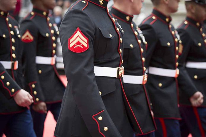 Marines in uniform standing in line, American flags displayed.