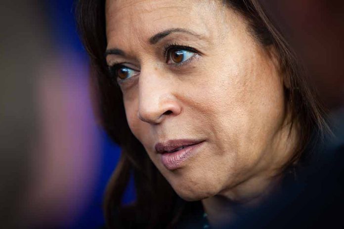 Woman with brown hair and thoughtful expression.