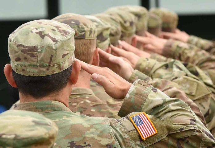 Soldiers in uniform saluting, American flag patch visible.