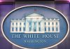 The White House emblem with blue background.