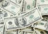 Multiple US one hundred dollar bills