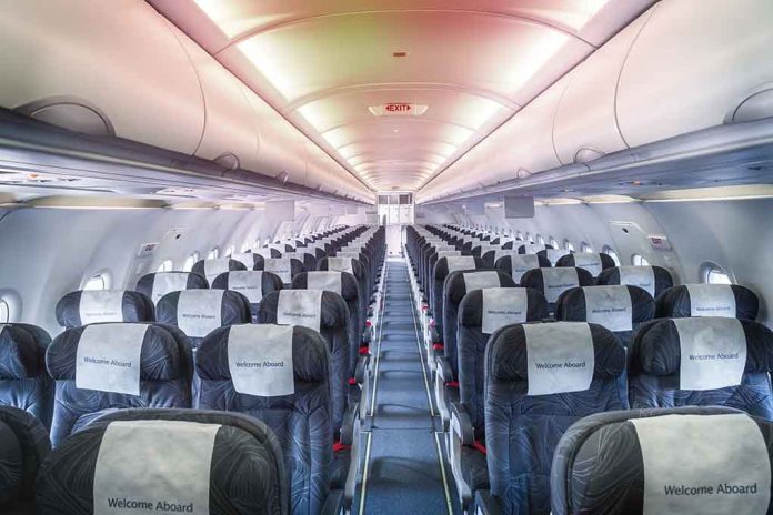 1889559274 featured image Empty airplane cabin with rows of seats
