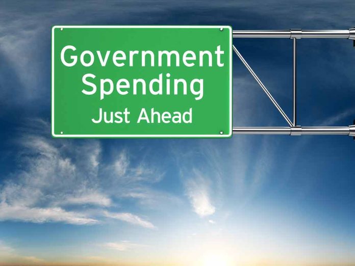 306579131 featured image Green road sign Government Spending Just Ahead