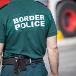 Person in Border Police uniform standing outdoors