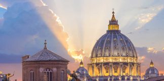 Sunset over St Peters Basilica in Vatican City
