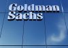Goldman Sachs sign on glass building facade