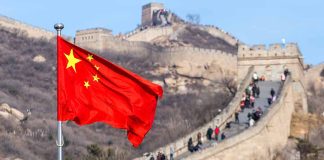 Chinese flag by the Great Wall of China