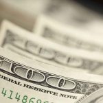 Close-up of hundred-dollar bills
