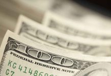 Close-up of hundred-dollar bills