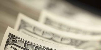 Close-up of hundred-dollar bills