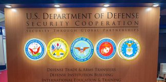 U.S. Department of Defense Security Cooperation display with logos