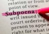 "Subpoena" highlighted in pink in a dictionary.