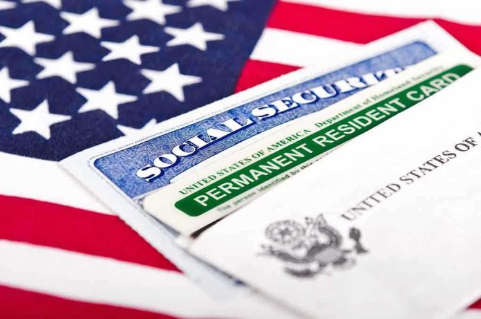 Social Security card and green card on flag