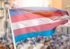 Transgender pride flag waving at outdoor event