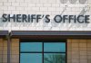 Sheriffs Office sign on brick building faade