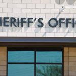 Sheriffs Office sign on brick building faade