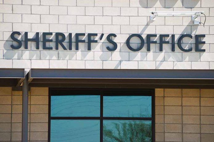 2208944897 featured image Sheriffs Office sign on brick building faade