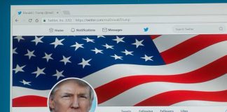 Twitter profile page with American flag banner