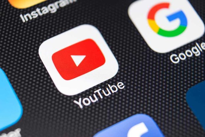 1009422034 YouTube and Google app icons on a smartphone screen