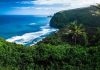Beautiful coastal landscape with lush greenery and ocean waves