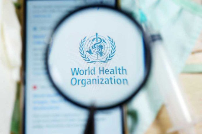 1730307721 Magnifying glass focused on World Health Organization logo