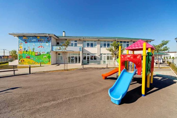 20485255 featured image Colorful playground slide in front of a building
