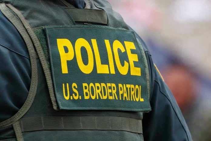 2331437679 US Border Patrol uniform closeup