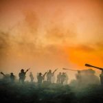Soldiers and tanks in the foggy battlefield