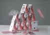 Collapsing house of cards in motion.