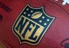 Close up of an NFL football with the logo prominently displayed