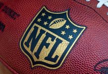 Close up of an NFL football with the logo prominently displayed