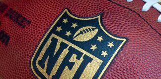 Close up of an NFL football with the logo prominently displayed