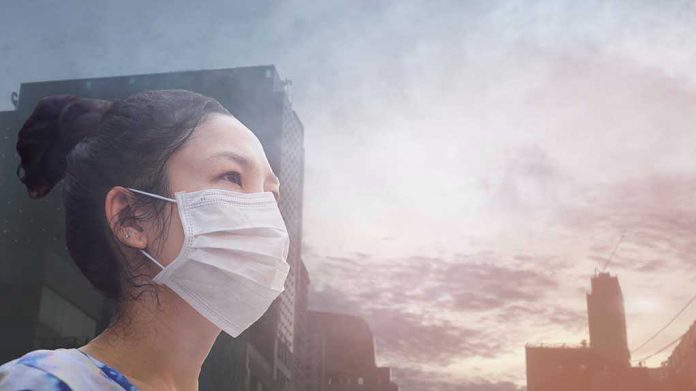 1300560961 Person wearing a mask in a cityscape background
