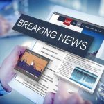 Breaking news on a digital tablet screen.