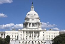 Jeffries’ CRIMINAL Warnings Stuns Trump Donors U.S. Capitol building against blue sky.