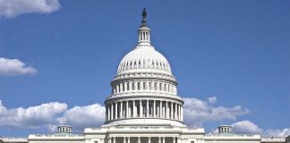 Jeffries’ CRIMINAL Warnings Stuns Trump Donors U.S. Capitol building against blue sky.