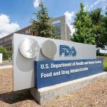 FDA Issues WARNING: Popular Pill Recalled! FDA building sign with blue sky background.