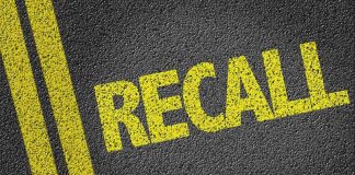 Nationwide Automotive Recall – Dangerous Safety DEFECT! Yellow RECALL text on asphalt background.