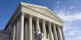 Shocking Supreme Court Move: 16 States on Edge Supreme Court building with statue and columns.