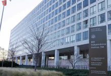Comedian SLAMS Sean Duffy – Who Does He Think He Is? Orville Wright Federal Building with flags outside.