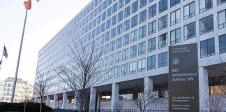 Comedian SLAMS Sean Duffy – Who Does He Think He Is? Orville Wright Federal Building with flags outside.