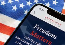 Smartphone and American flag promoting Republican National Committee.