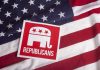 GOP MELTDOWN: Wild Funding Bill War Erupts Republican symbol on American flag background.