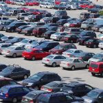 Disabled Parking UNDER FIRE—New Law Shocks State! A crowded parking lot filled with various cars