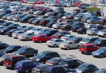 Disabled Parking UNDER FIRE—New Law Shocks State! A crowded parking lot filled with various cars