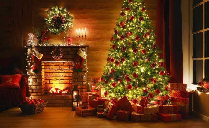 1552736867 Christmas tree and fireplace with stockings and gifts.