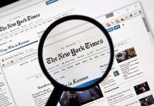 NY Times Caught in Racial Rant – Inflammatory Comments! Magnifying glass over The New York Times website.