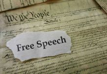 Old document with text Free Speech overlay