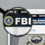 FBI Issues ALERT – Terrifying New Kidnapping Trend FBI website shown through magnifying glass.