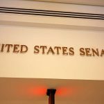 Disgraced Rep Enters Senate Race – HUGE Gambit Sign displaying United States Senate in a government building